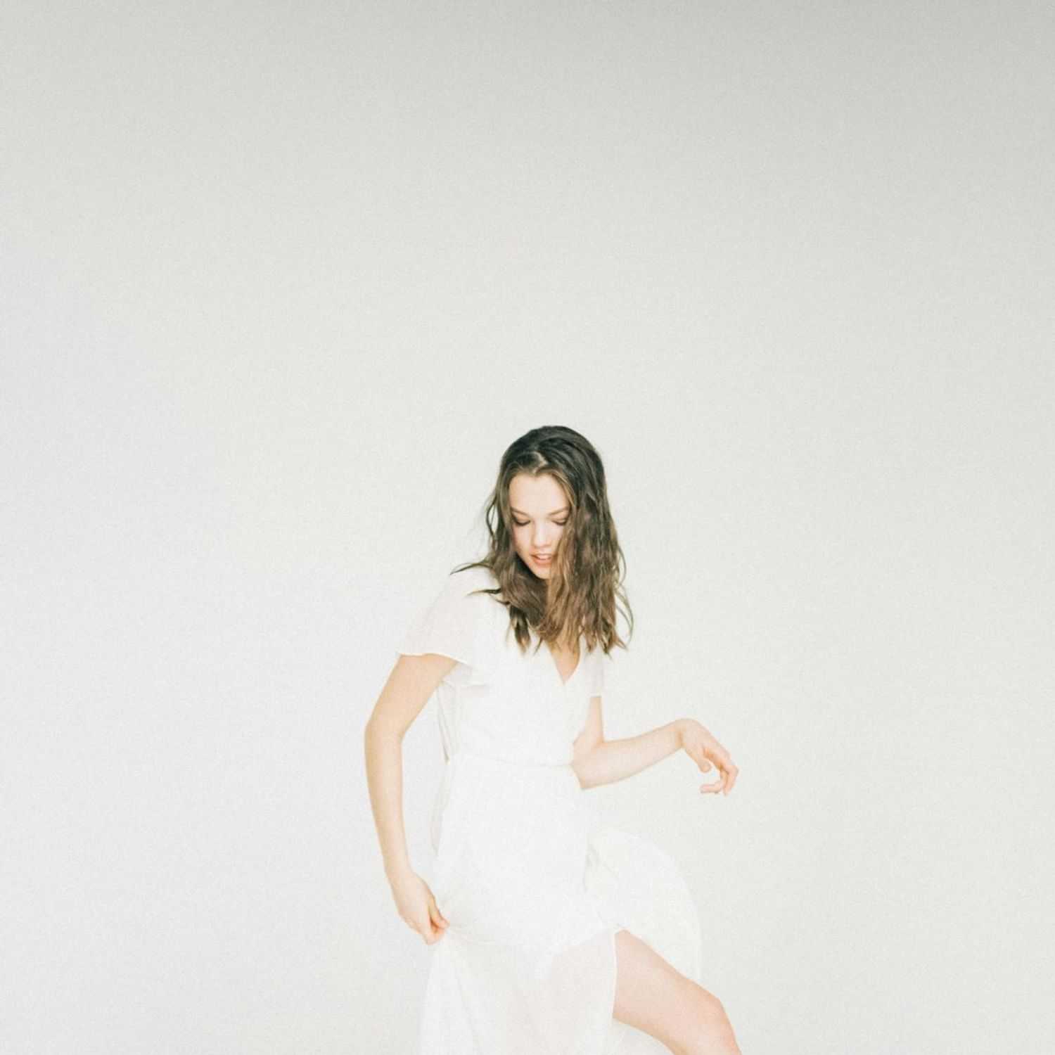 Portrait of Lily C., a professional stylist at Turn Heads Salon, showcasing their expertise and style.