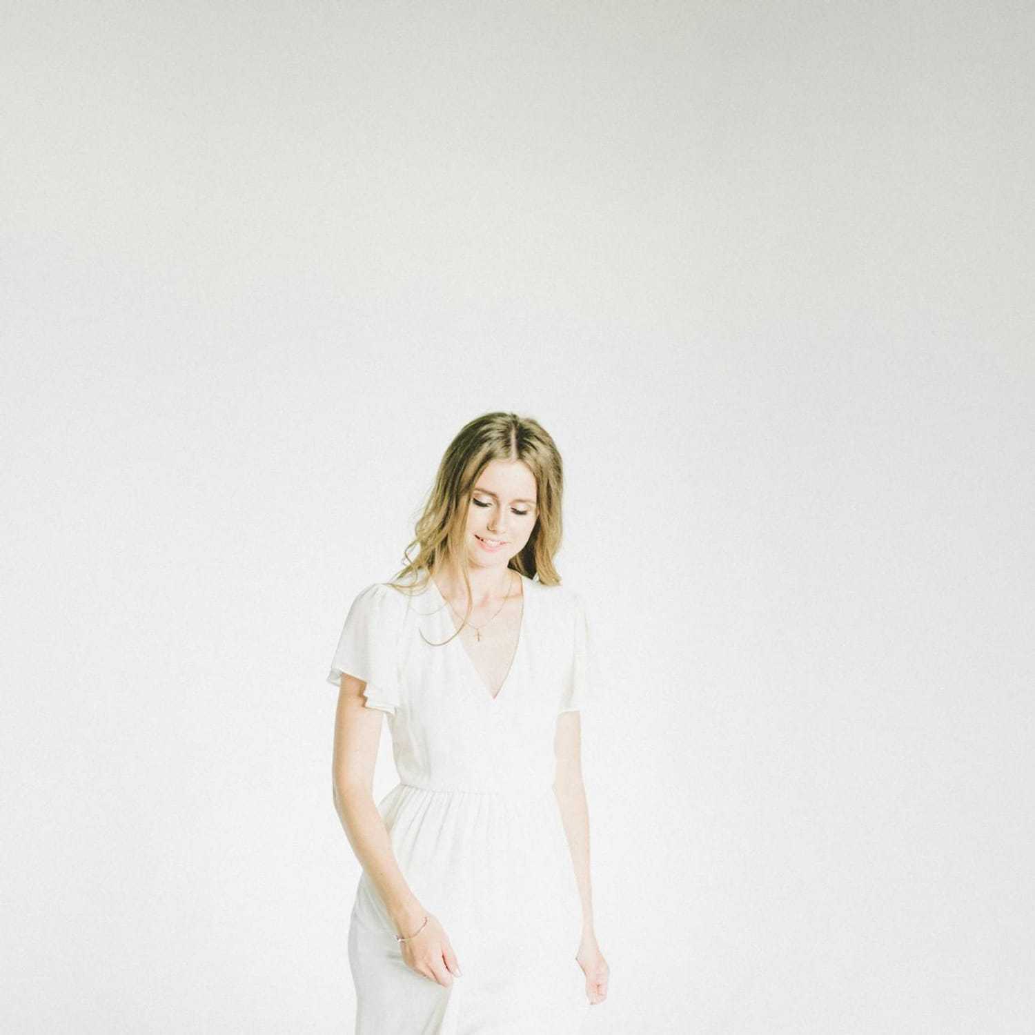 Portrait of Maya A., a professional stylist at Turn Heads Salon, showcasing their expertise and style.