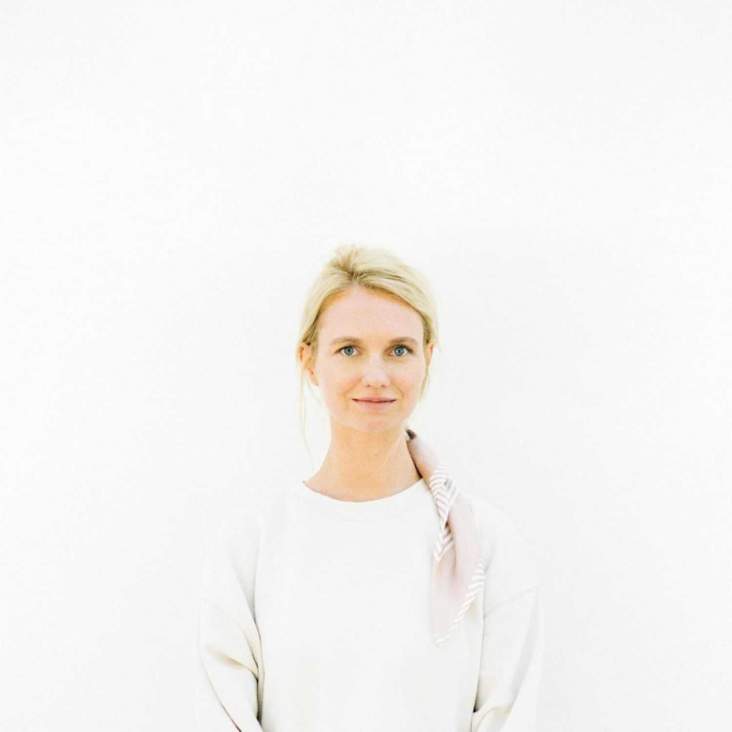 Portrait of Tasha G., a professional stylist at Turn Heads Salon, showcasing their expertise and style.