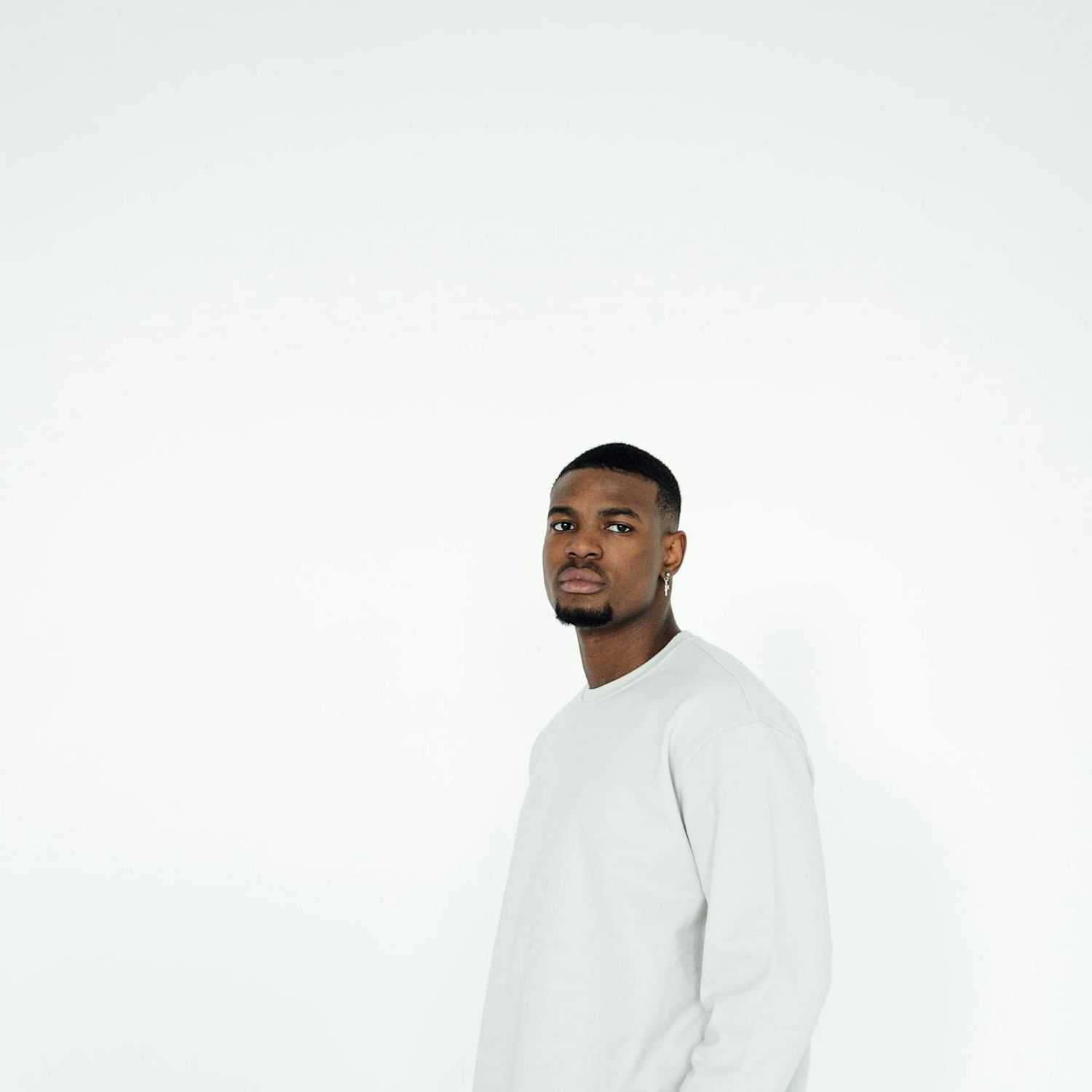 Portrait of Jordan Matthews, a professional stylist at Turn Heads Salon, showcasing their expertise and style.